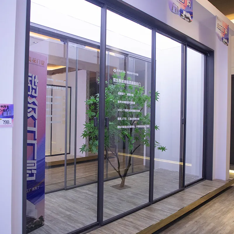 Arc-shaped, borderless, double-track, four-panel sliding door