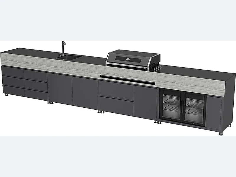 How far should an outdoor kitchen be from the house?