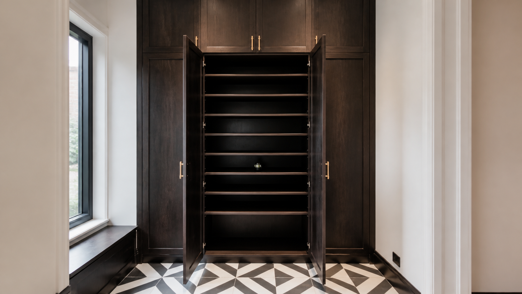 floor-to-ceiling dark wood storage cabinet, used to illustrate checks for sliding wardrobe door reliability