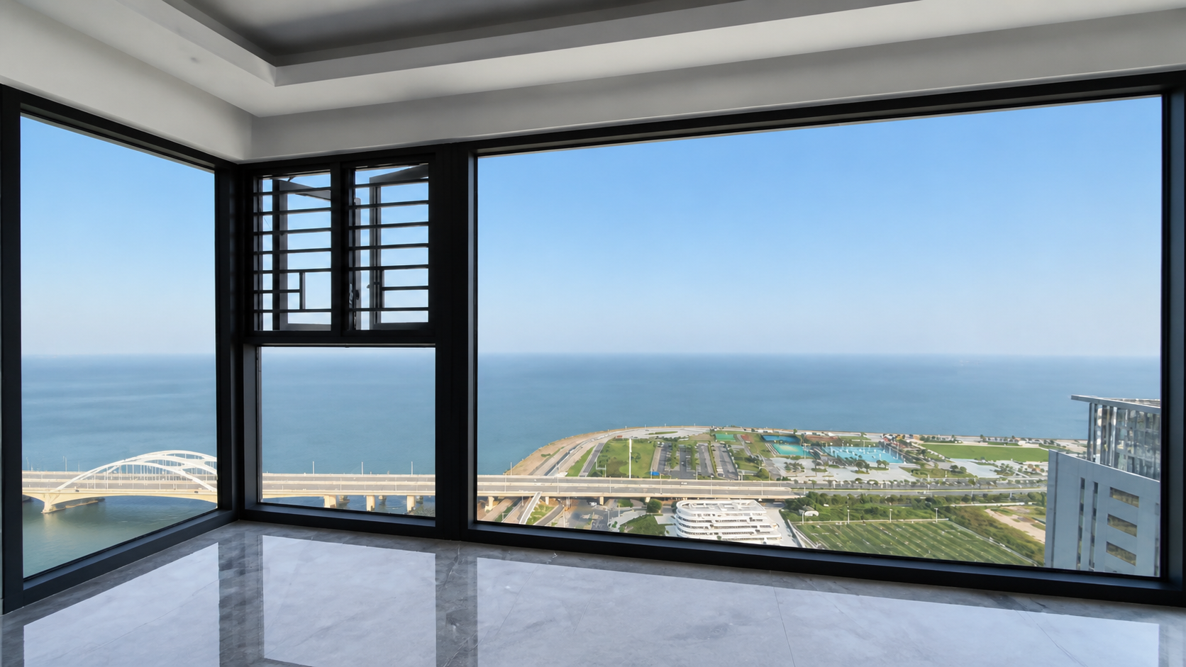 Panoramic aluminum corner glazing overlooking the ocean — example related to whole-product heat flow and climate-specific solar control