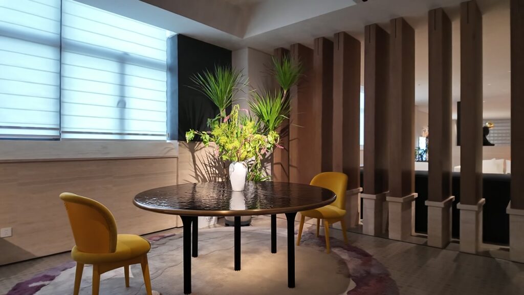 Dark Round Dining Table in Warm Interior