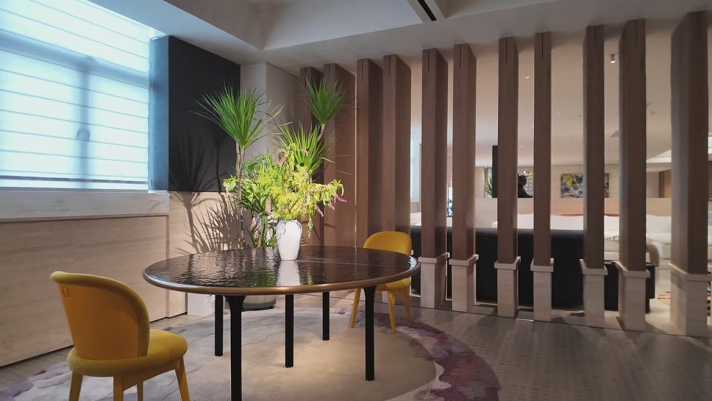 Dining Area with Slatted Wood Room Divider