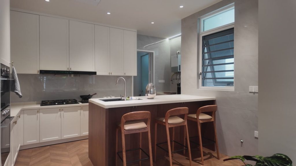White Kitchen with Walnut Peninsula Island
